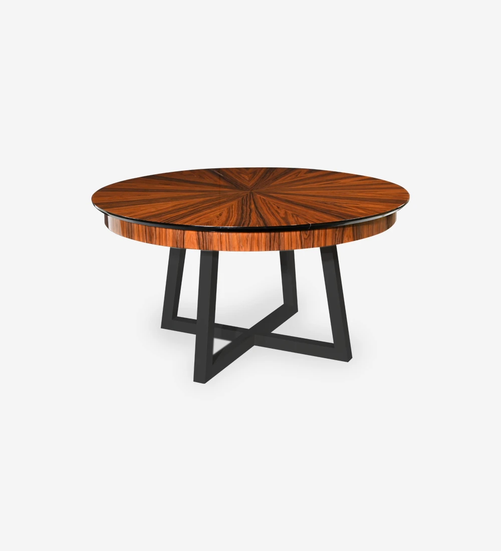 Round extendable dining table with top in high gloss palissander and black lacquered legs.