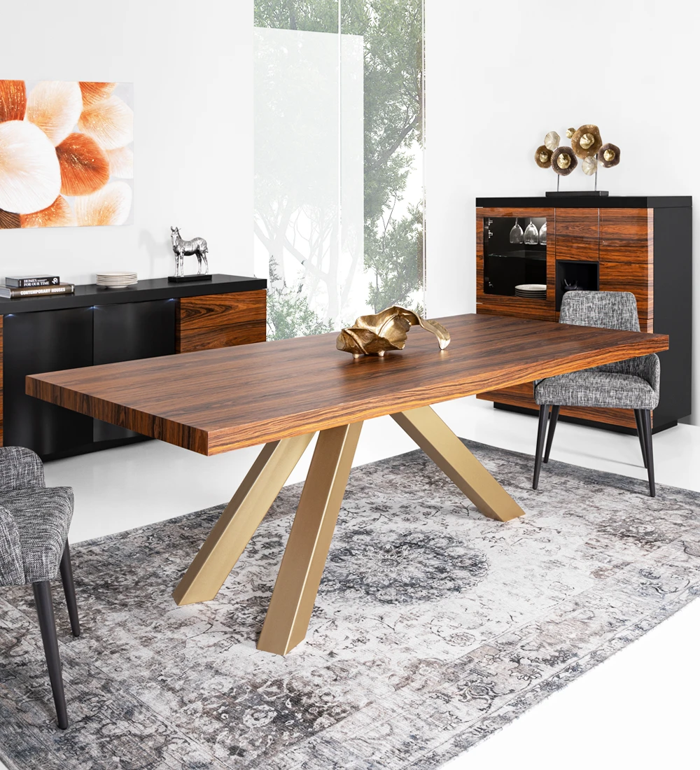 Rectangular dining table with palissander top and gold lacquered metal legs.