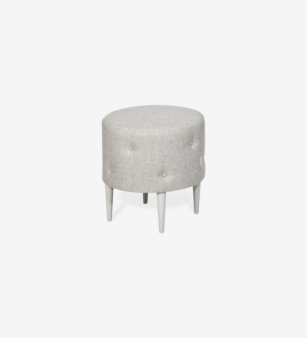Round, upholstered in fabric, with buttons and legs lacquered in pearl.