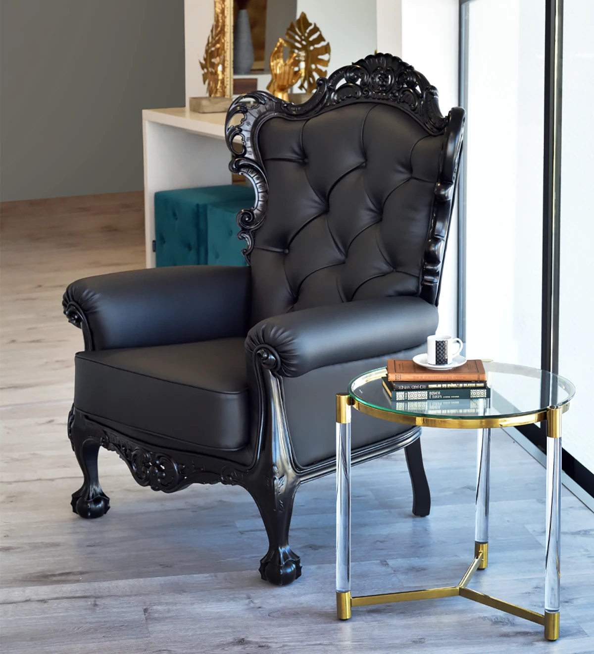 Upholstered in fabric, black lacquered structure.