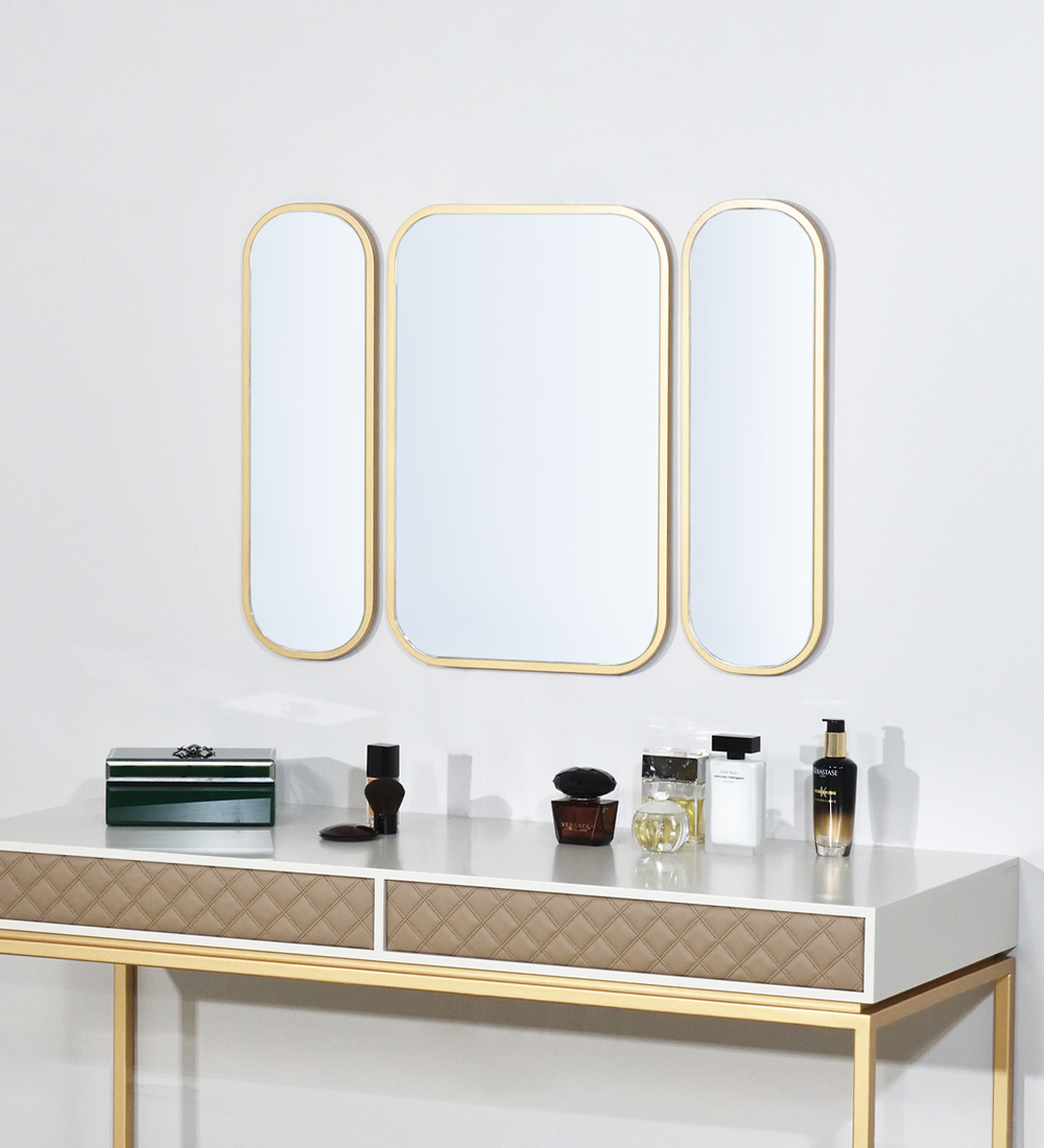 Mirror with gold lacquered frame.