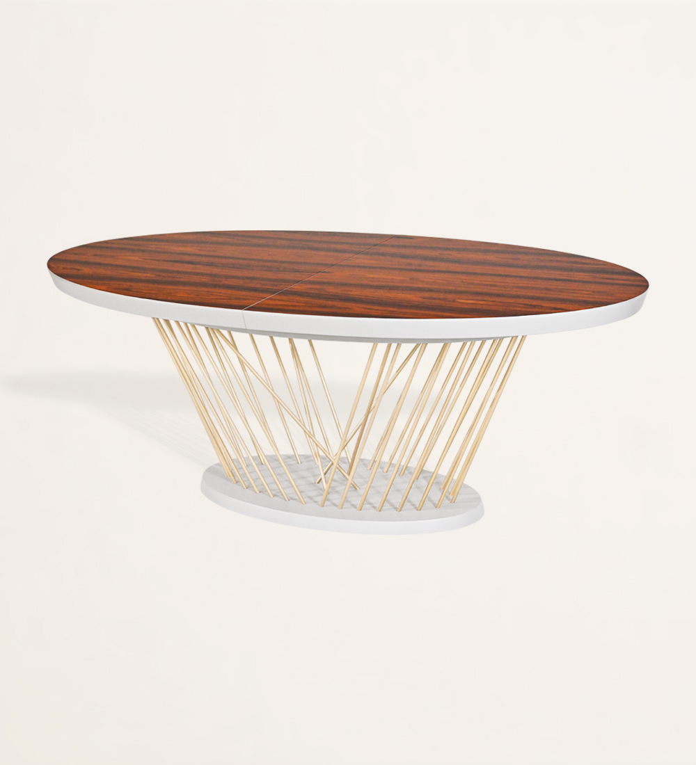 Table de repas ovale extensible avec plateau en palissandre brillant, pieds en métal laqué or et base laquée perle.