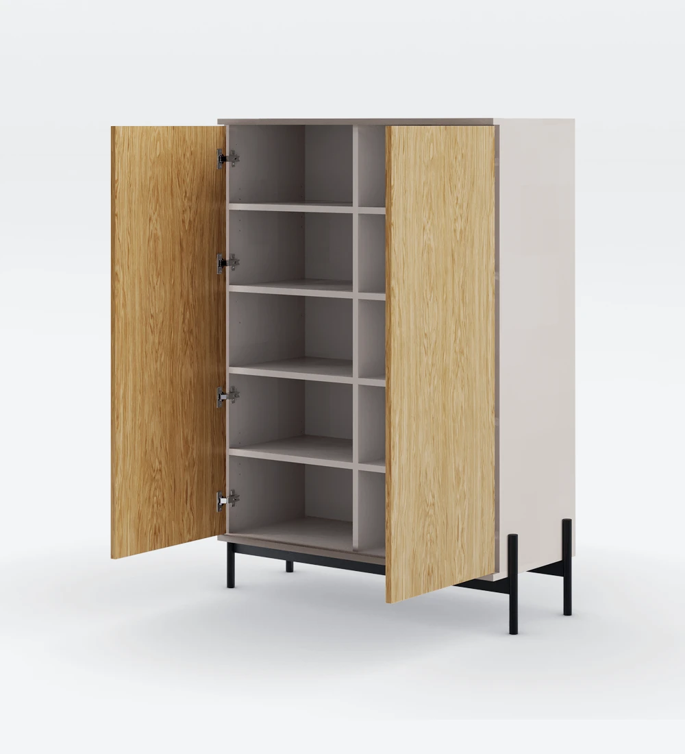 Cupboard with 2 doors in natural oak, pearl structure and black lacquered metal feet with levellers.