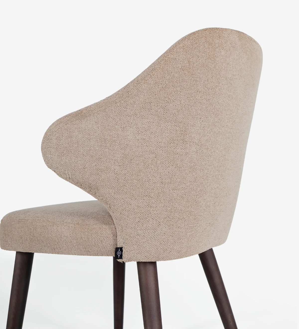 Fabric upholstered chair with dark brown ash wood feet.