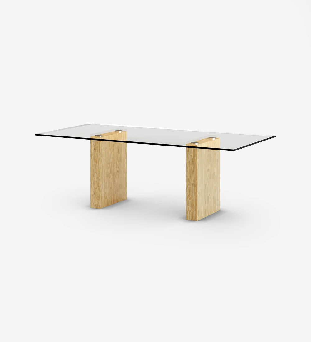 Rectangular dining table with glass top, legs in natural oak.