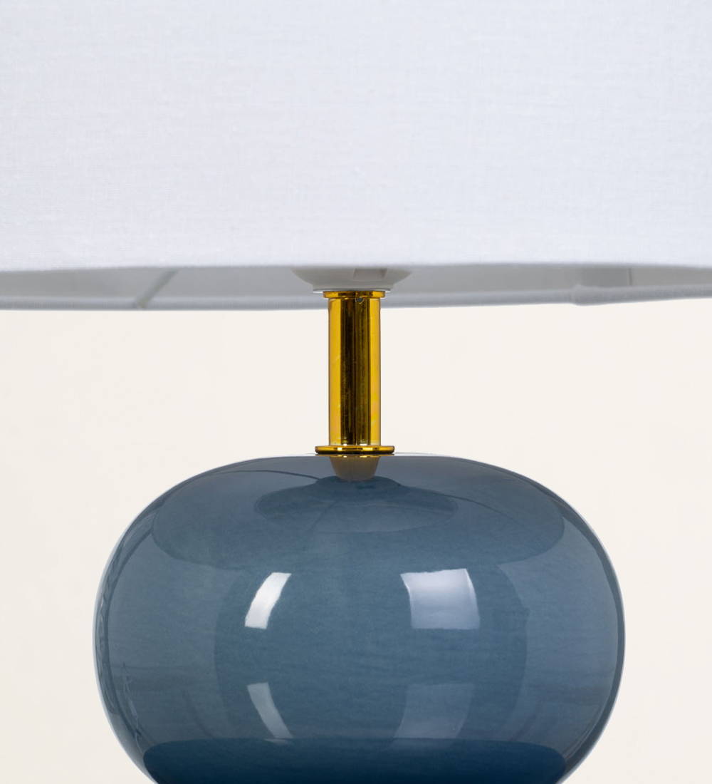 Blue ceramic table lamp with shade