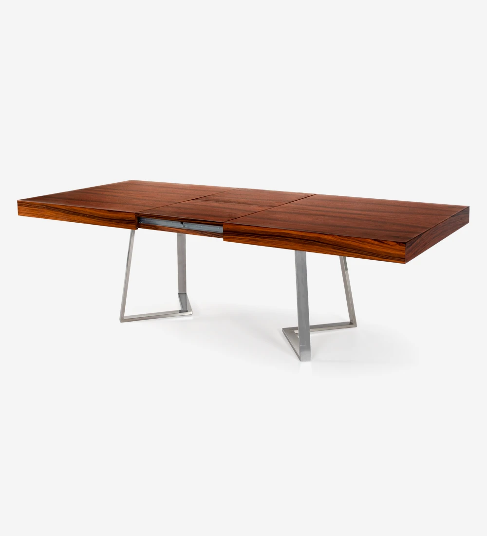 Rectangular extendable dining table with high gloss palissander top and stainless steel foot.