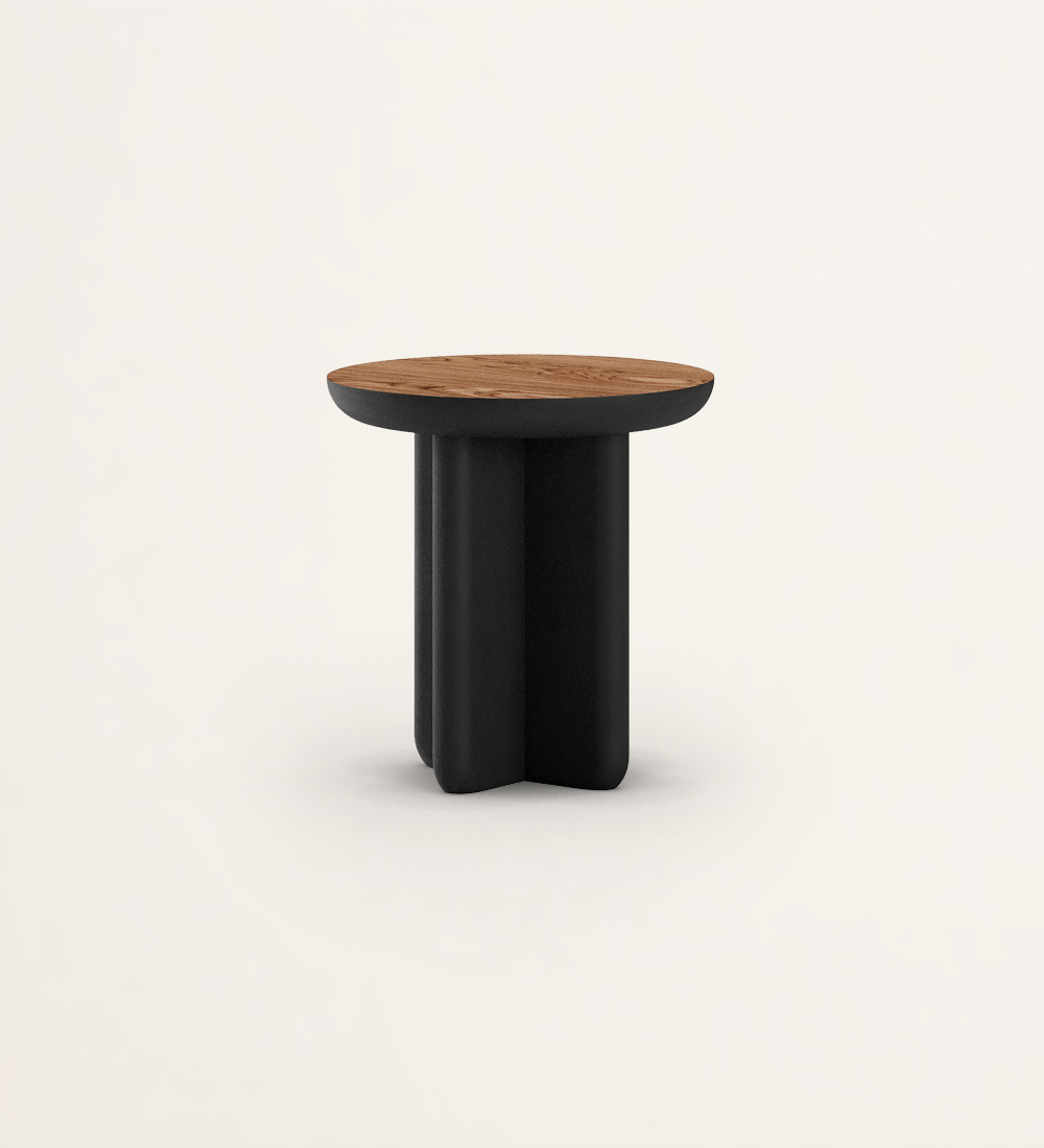 Round side table with black lacquered legs and selected walnut top.
