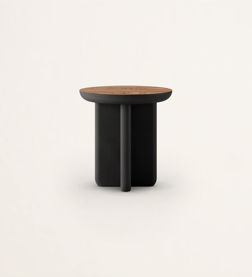 Round side table with black lacquered legs and selected walnut top.