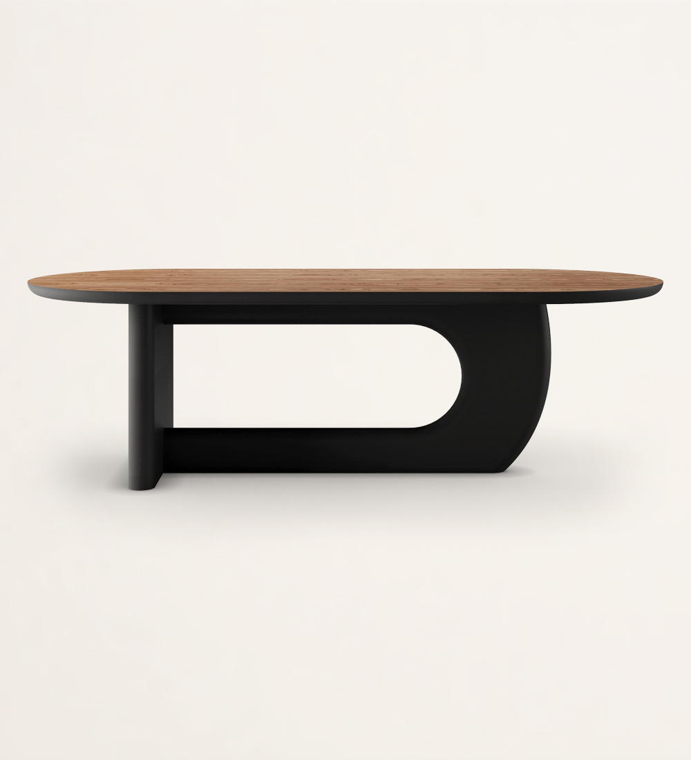 Oval dining table with black lacquered foot and high gloss walnut top.
