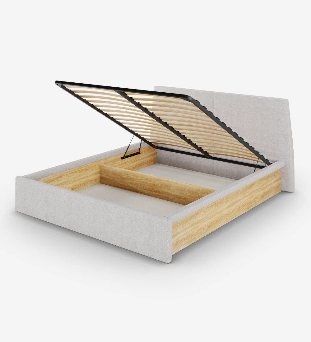 Cama Doble con cabecero tapizado y pie de cama en tejido, laterales en roble natural con canapé abatible mediante plataforma elevadora.