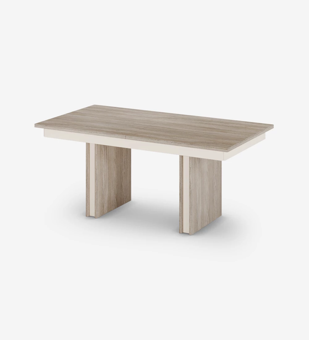 Rectangular extendable dining table in decapé oak and pearl detail.