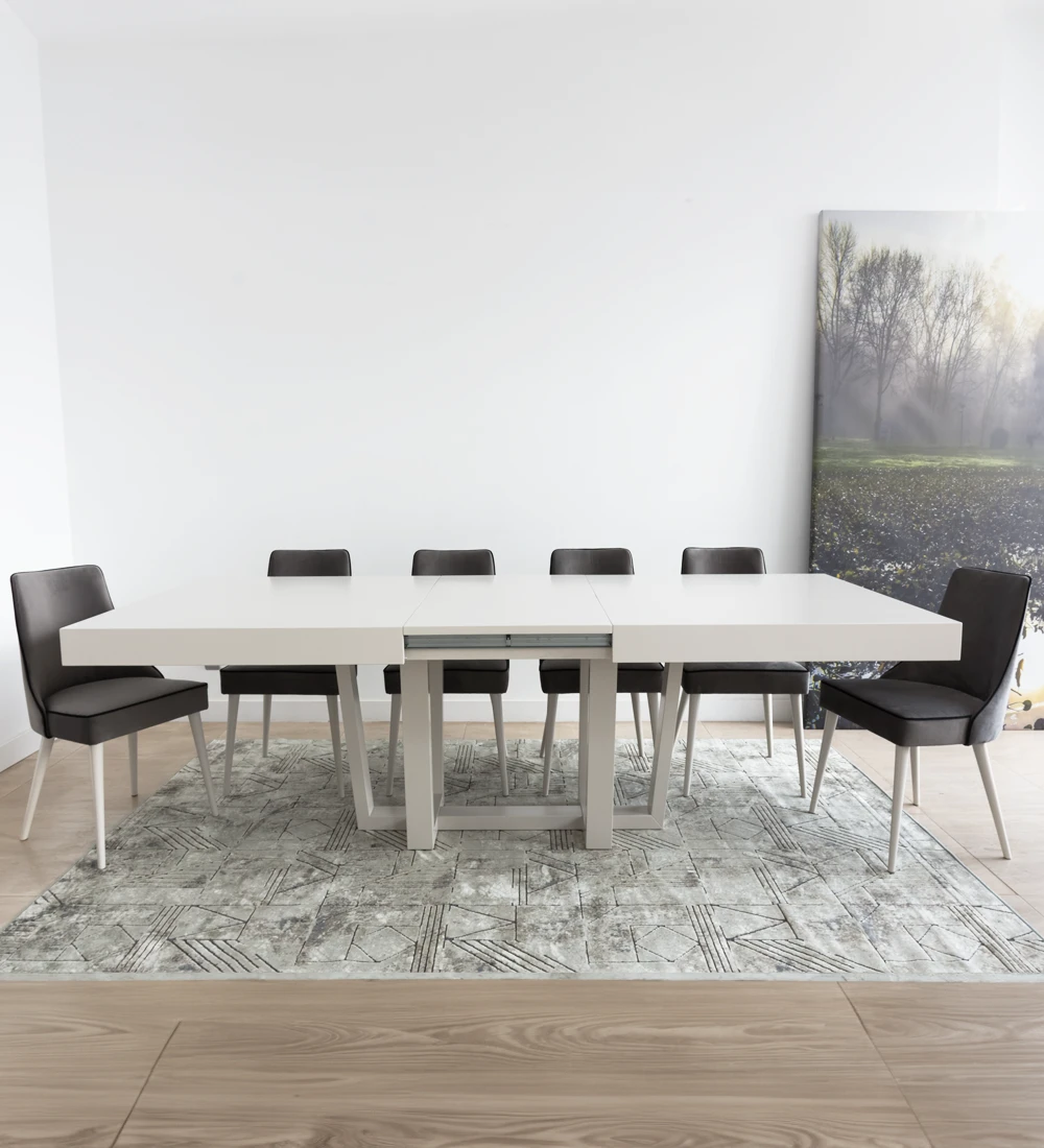 Rectangular extendable dining table with pearl lacquered top and legs.
