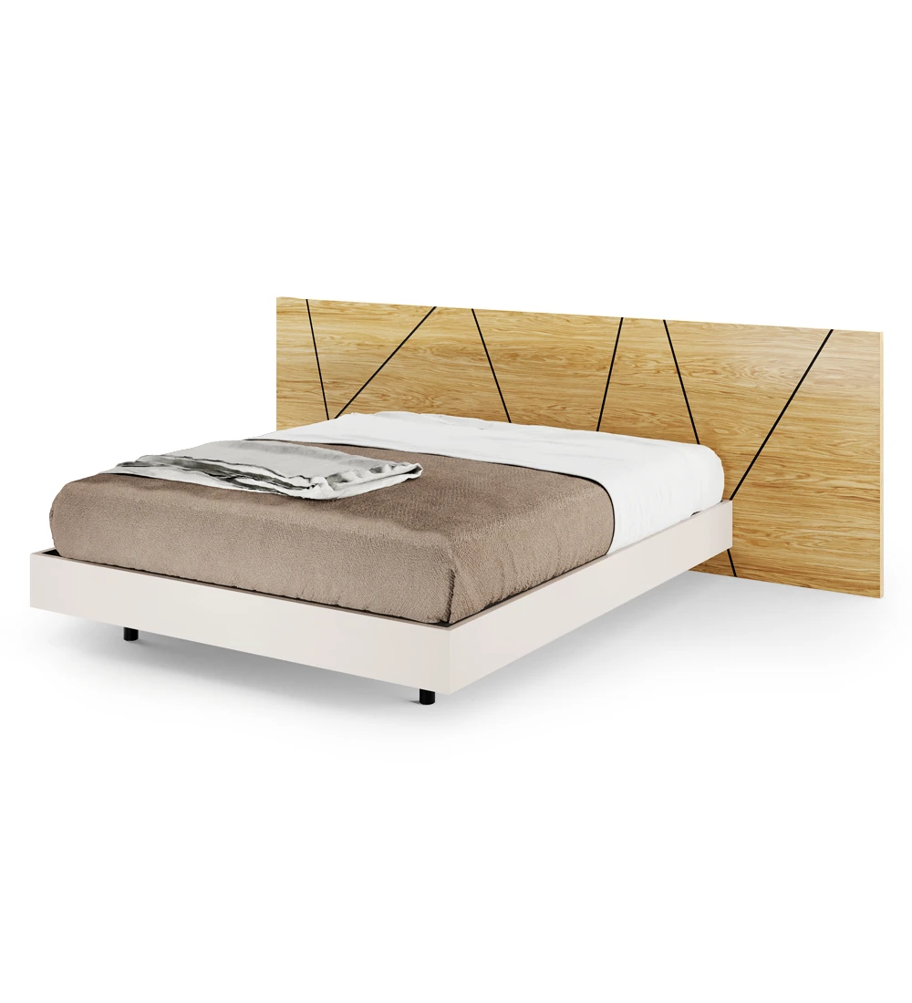 Double bed with abstract headboard in natural oak and suspended base in pearl.