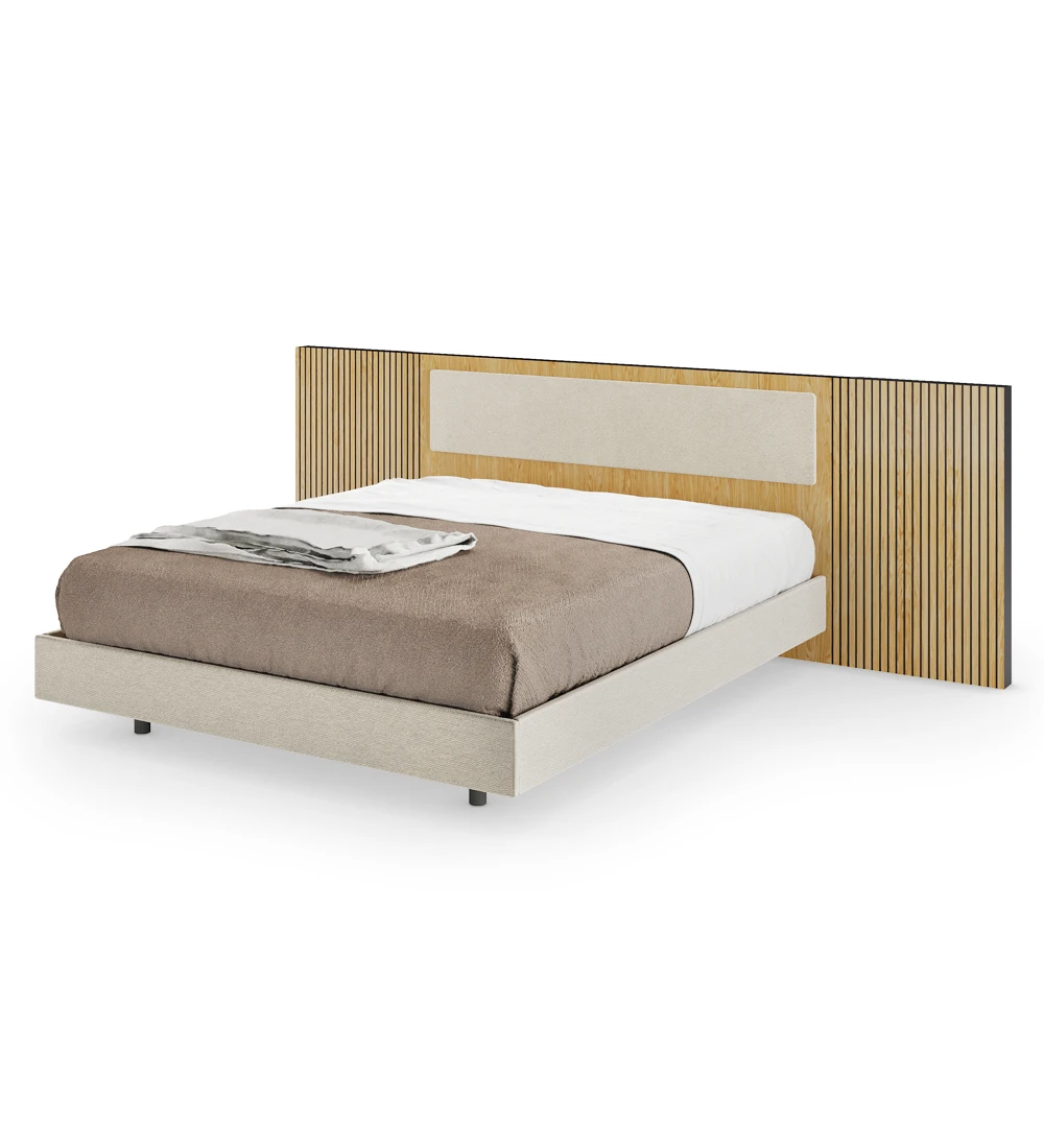 Double bed with upholstered headboard center panel, headboard sides with natural oak trim and upholstered hanging base.