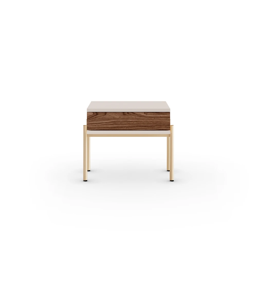 Bedside table with walnut drawer, pearl structure and golden lacquered metal feet with levelers.
