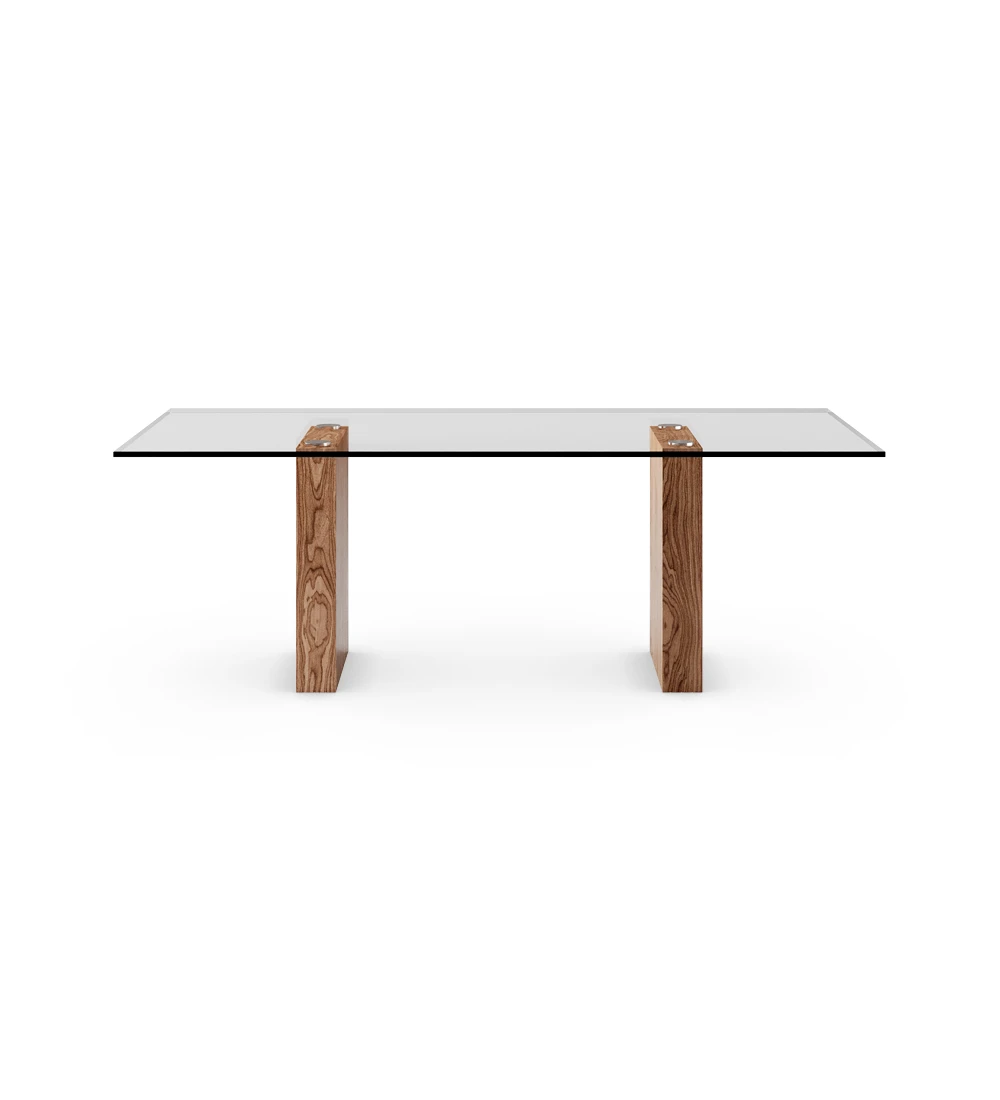 Rectangular dining table with glass top, walnut legs.