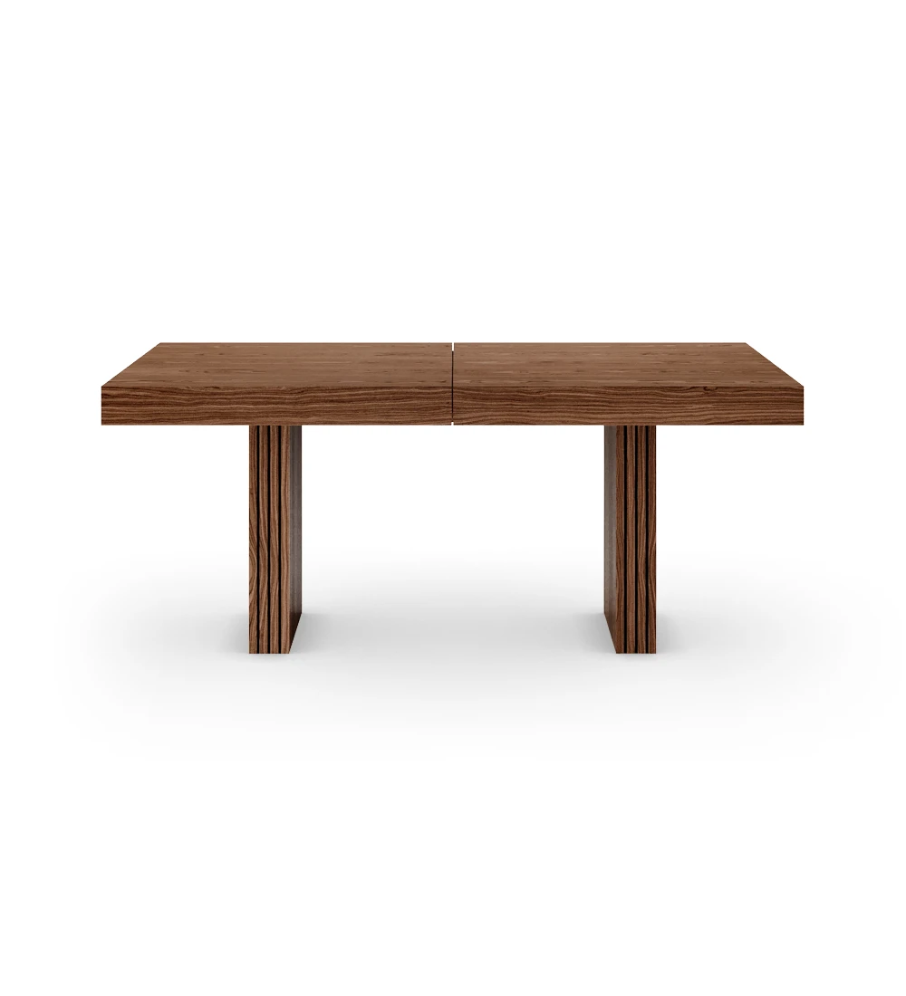 Rectangular extendable dining table in walnut, legs with friezes.