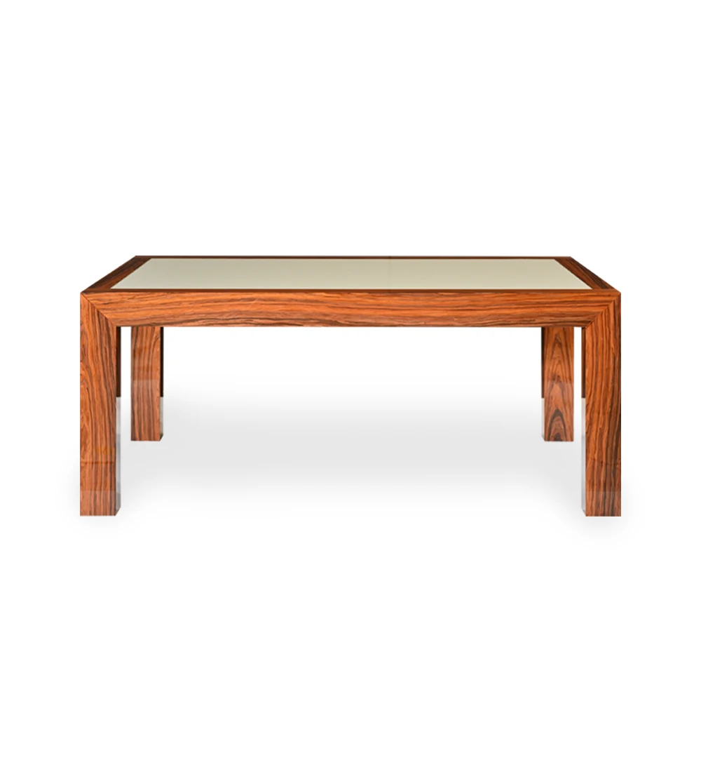 Table de repas rectangulaire extensible avec plateau en verre perlé et structure en palissandre brillant.