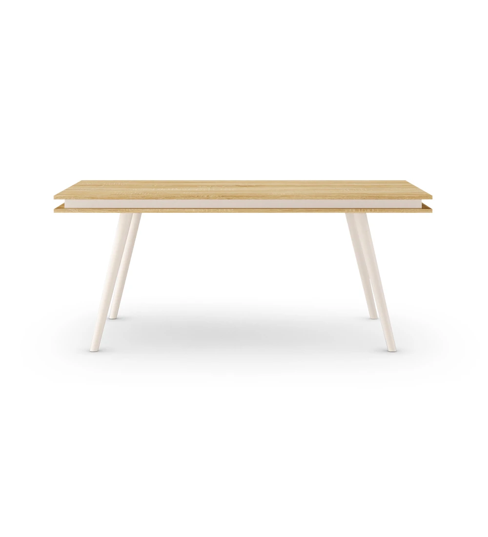 Rectangular extendable dining table with natural colored oak top, pearl lacquered legs.