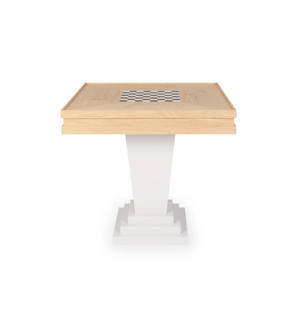 Mesa de juego con tablero de roble natural y pie lacado perla.