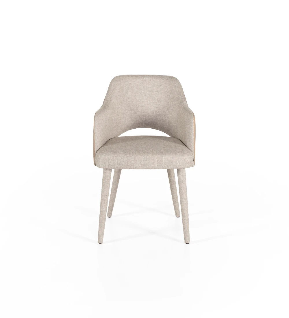 Chair with armrests upholstered in fabric.