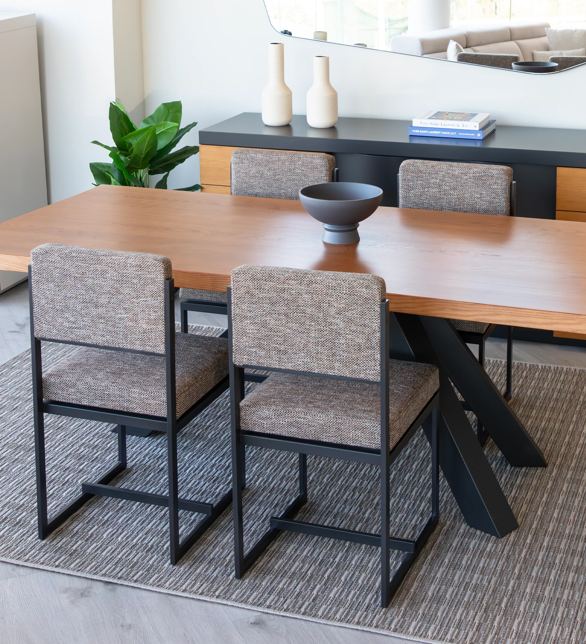 Chair with seat and back upholstered in fabric, with black lacquered metal structure