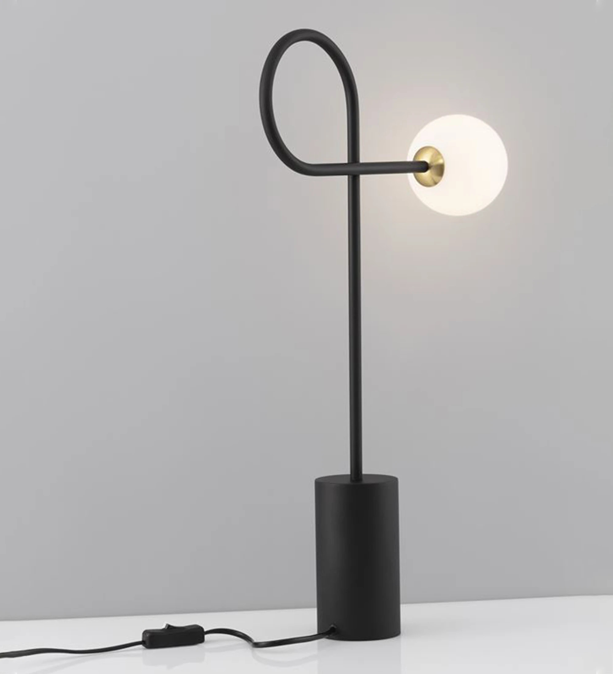  Table lamp in black aluminum and opal glass diffuser.