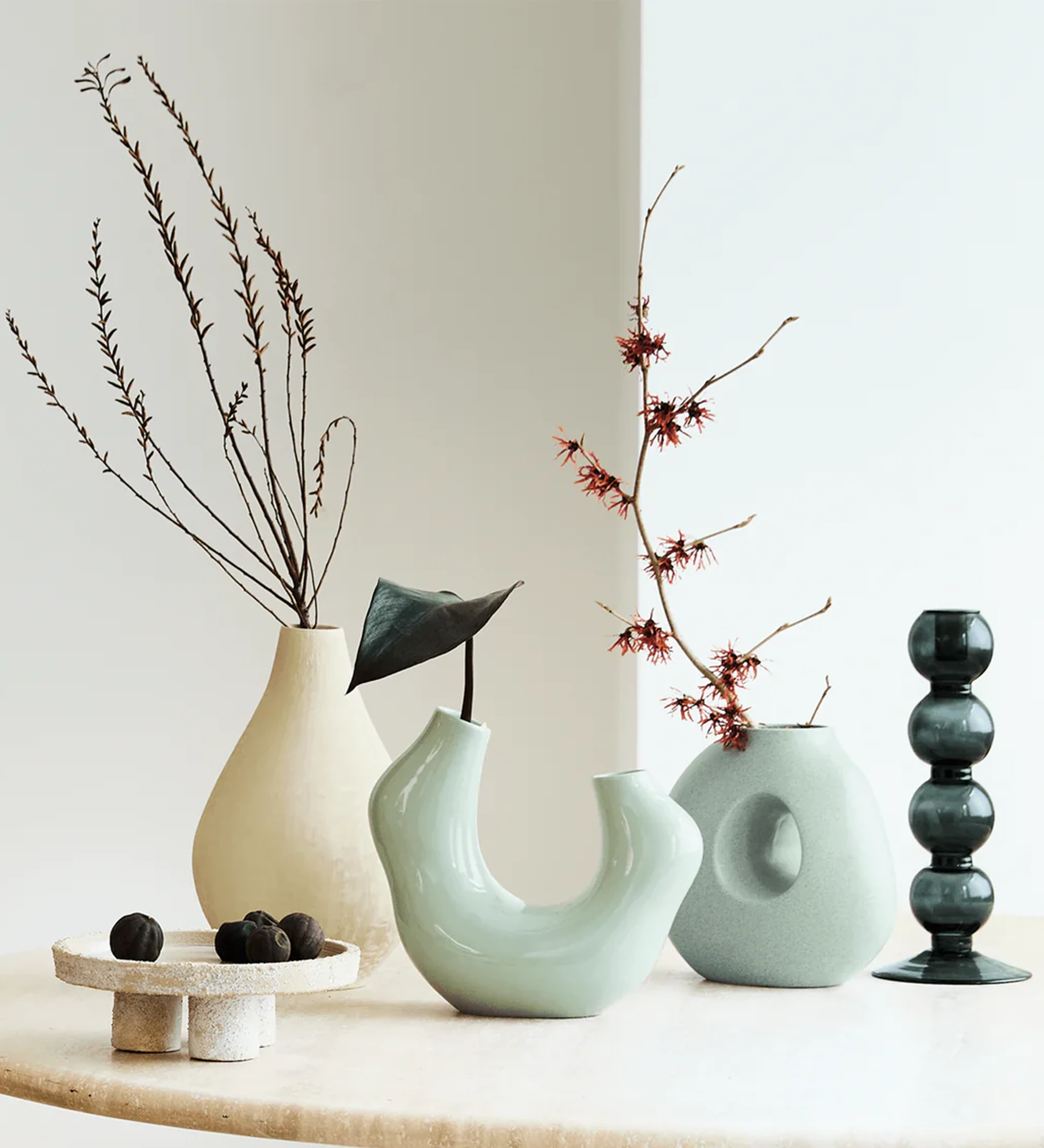 Handmade vase with a light blue slate ceramic structure, with a delicate splash.
