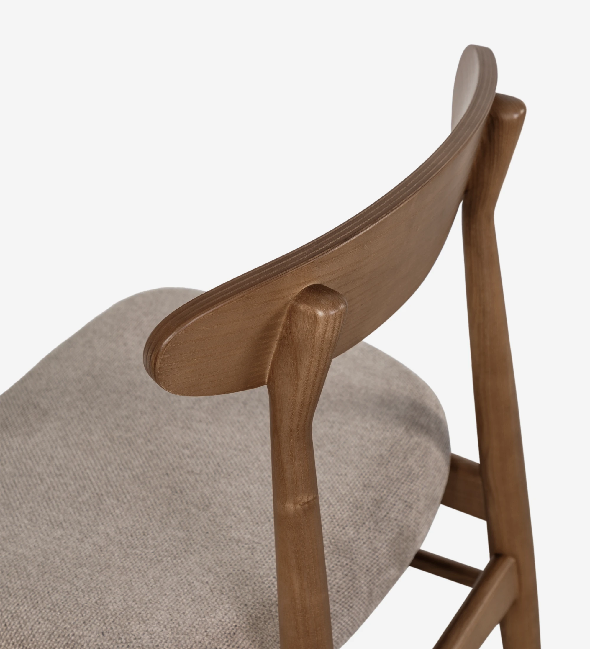 Chair with walnut wood structure and fabric upholstered seat.