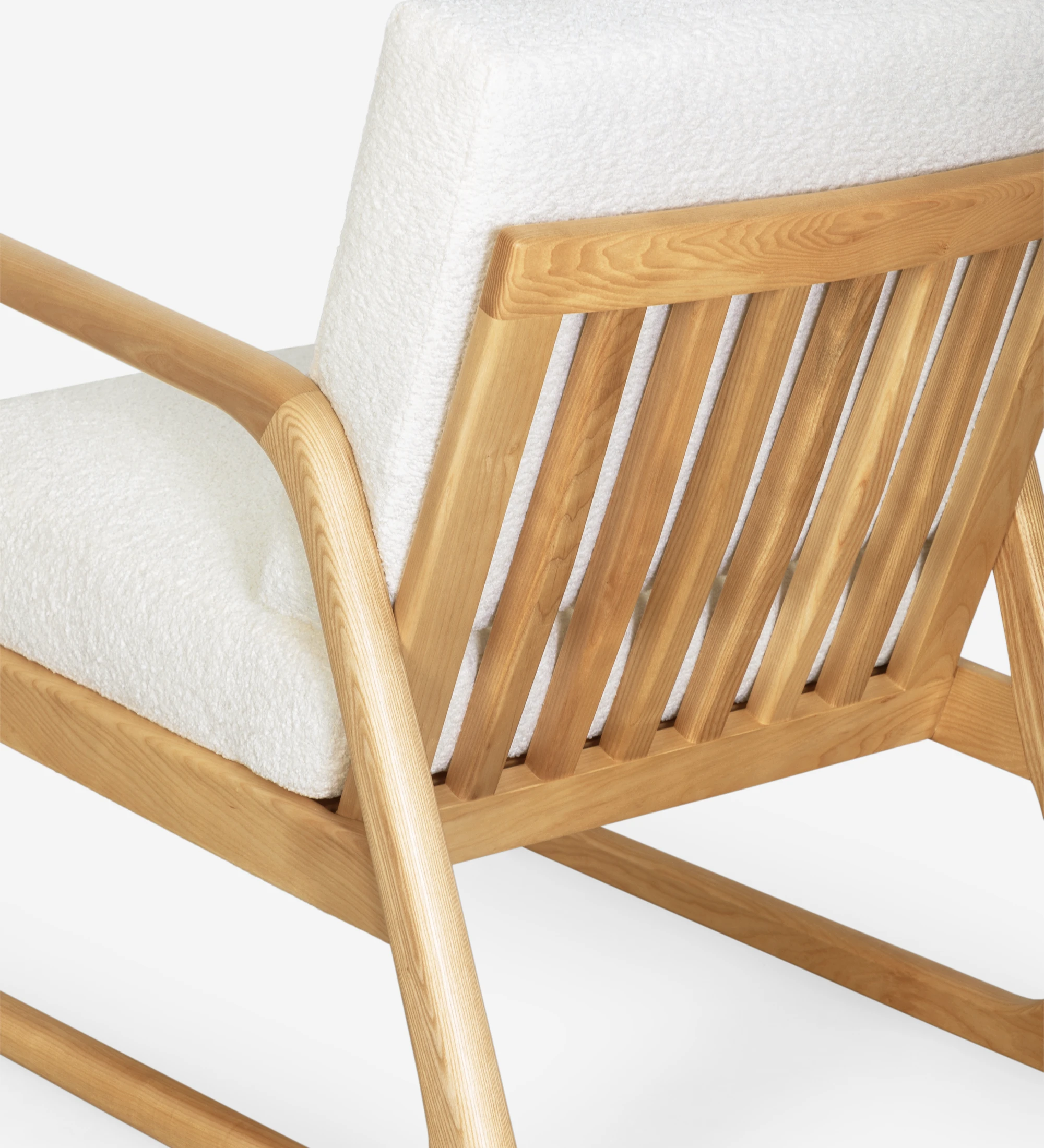 Antarte by AI Armchair upholstered in fabric, structure in natural wood.