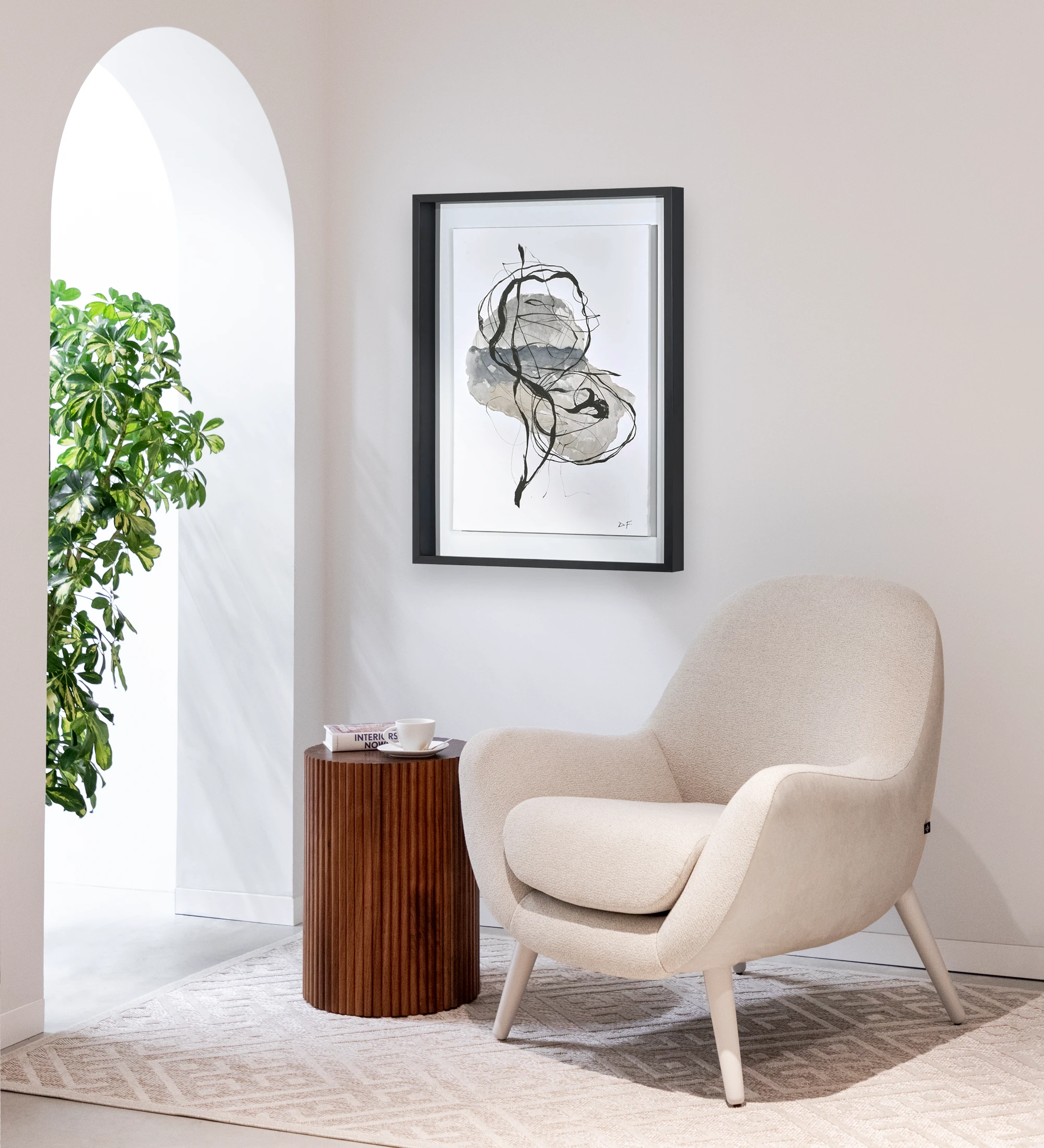 Oslo armchair upholstered in beige fabric,pearl lacquered feet.