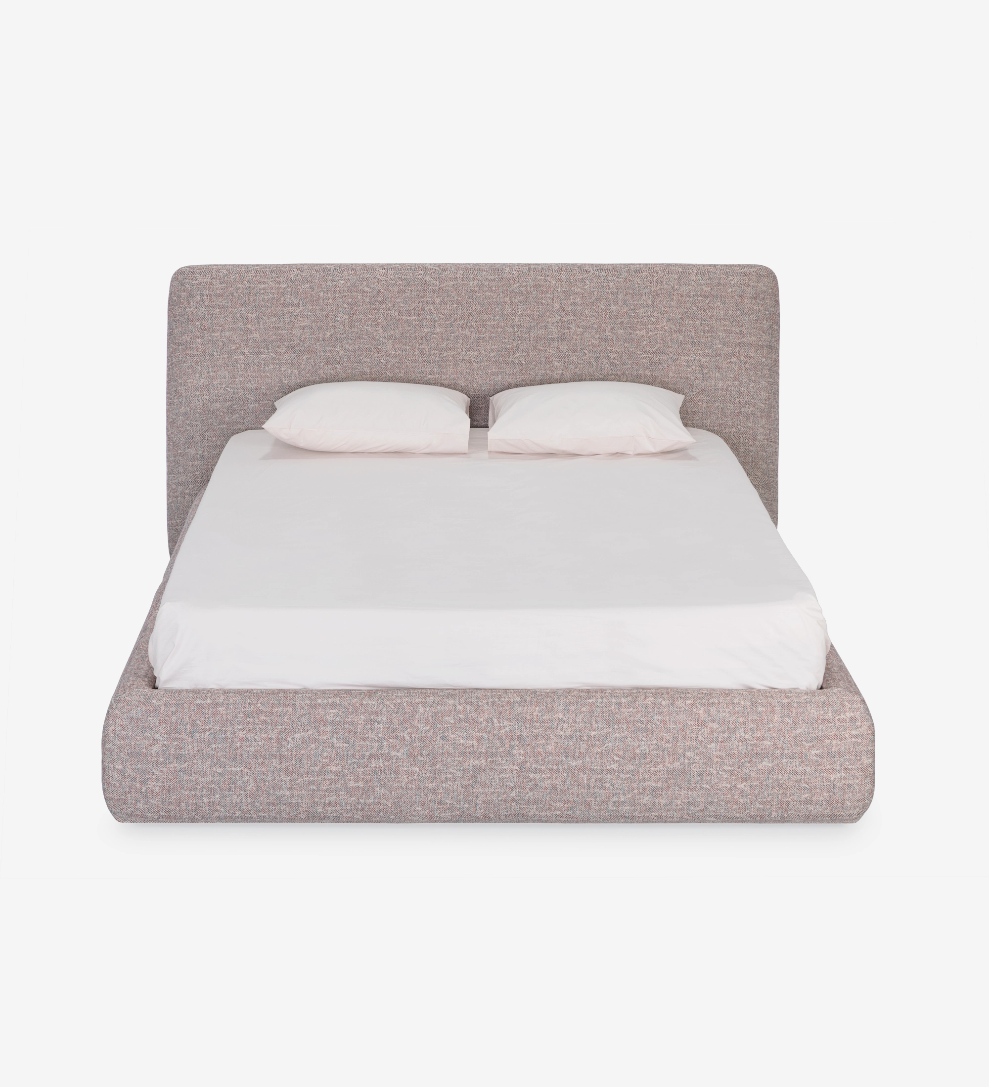 Double bed with short headboard, upholstered in multicolored fabric, primarily red and blue.