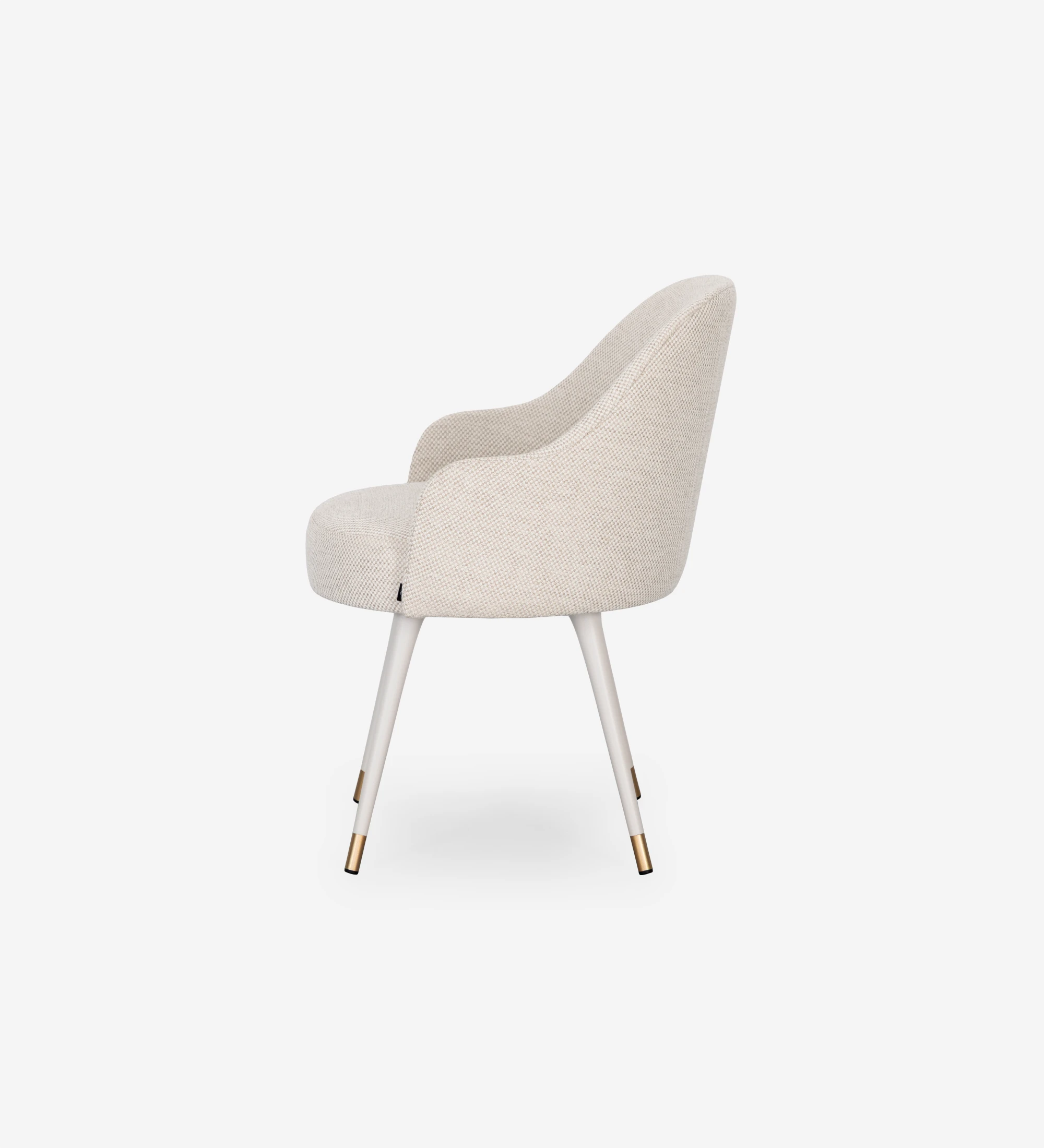Beige fabric upholstered swivel chair with pearl lacquered feet and gold detailing.