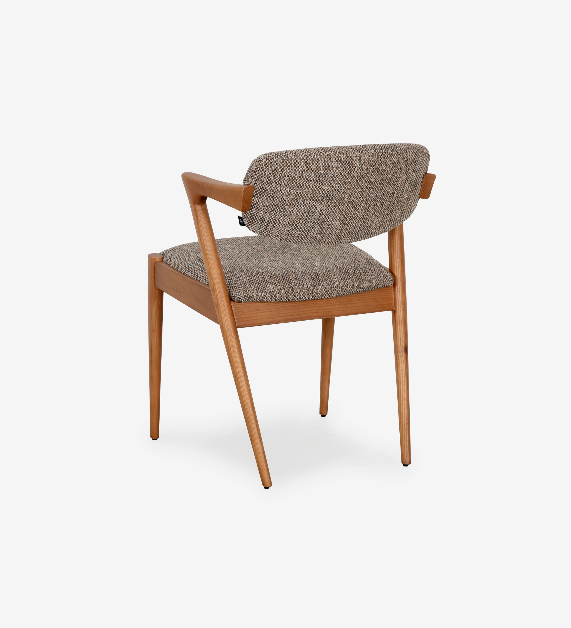 Chaise en frêne couleur miel, avec assise et dossier rembourrés en tissu multicolore, principalement dans les tons bruns et beige.