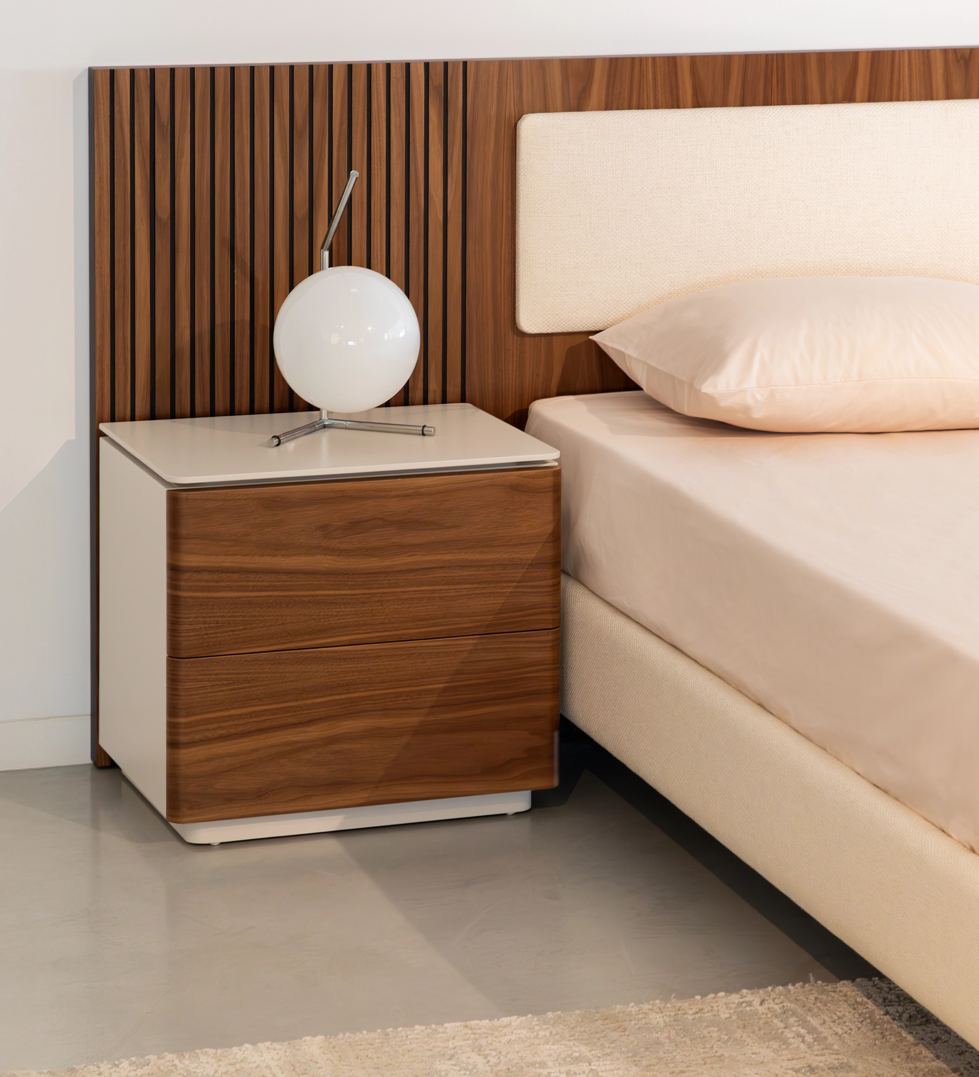 Bedside table with 2 drawers in natural walnut, pearl lacquered frame.