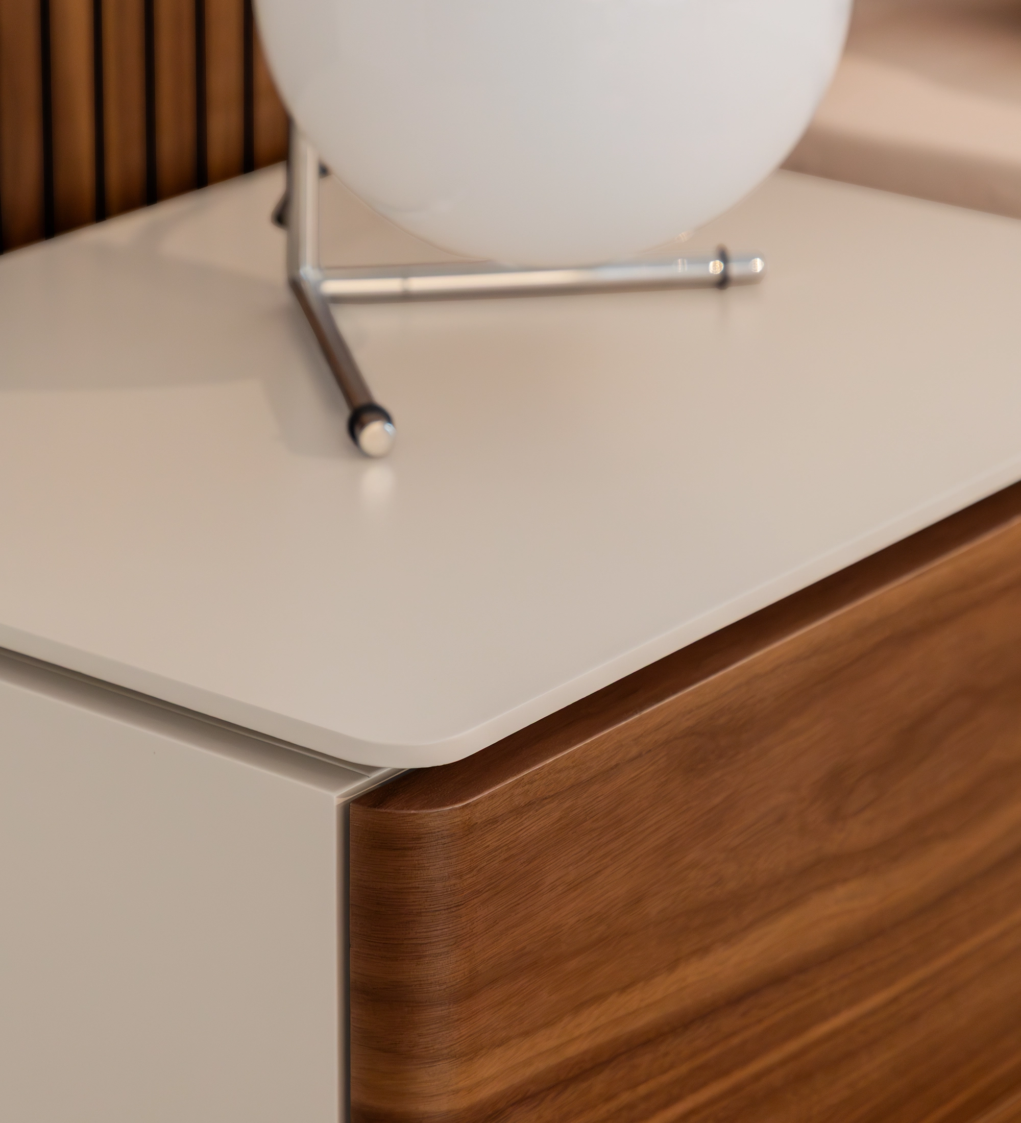 Bedside table with 2 drawers in natural walnut, pearl lacquered frame.
