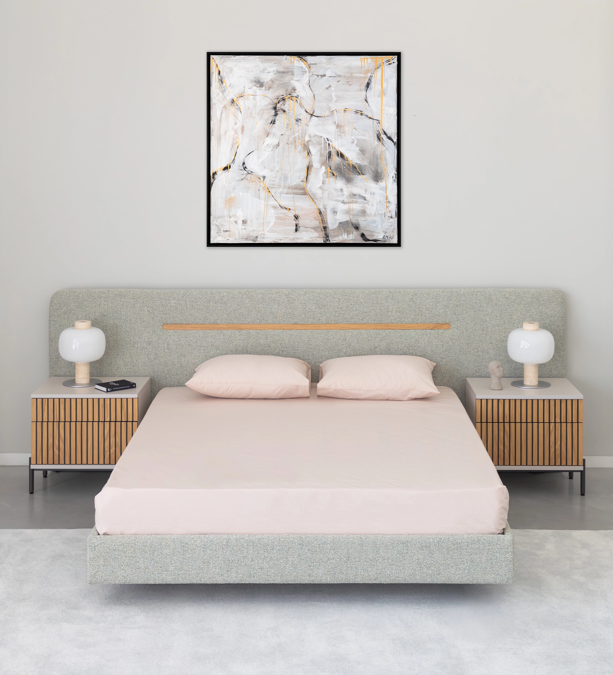 Double bed with upholstered headboard and floating base in green fabric, detail in natural oak.