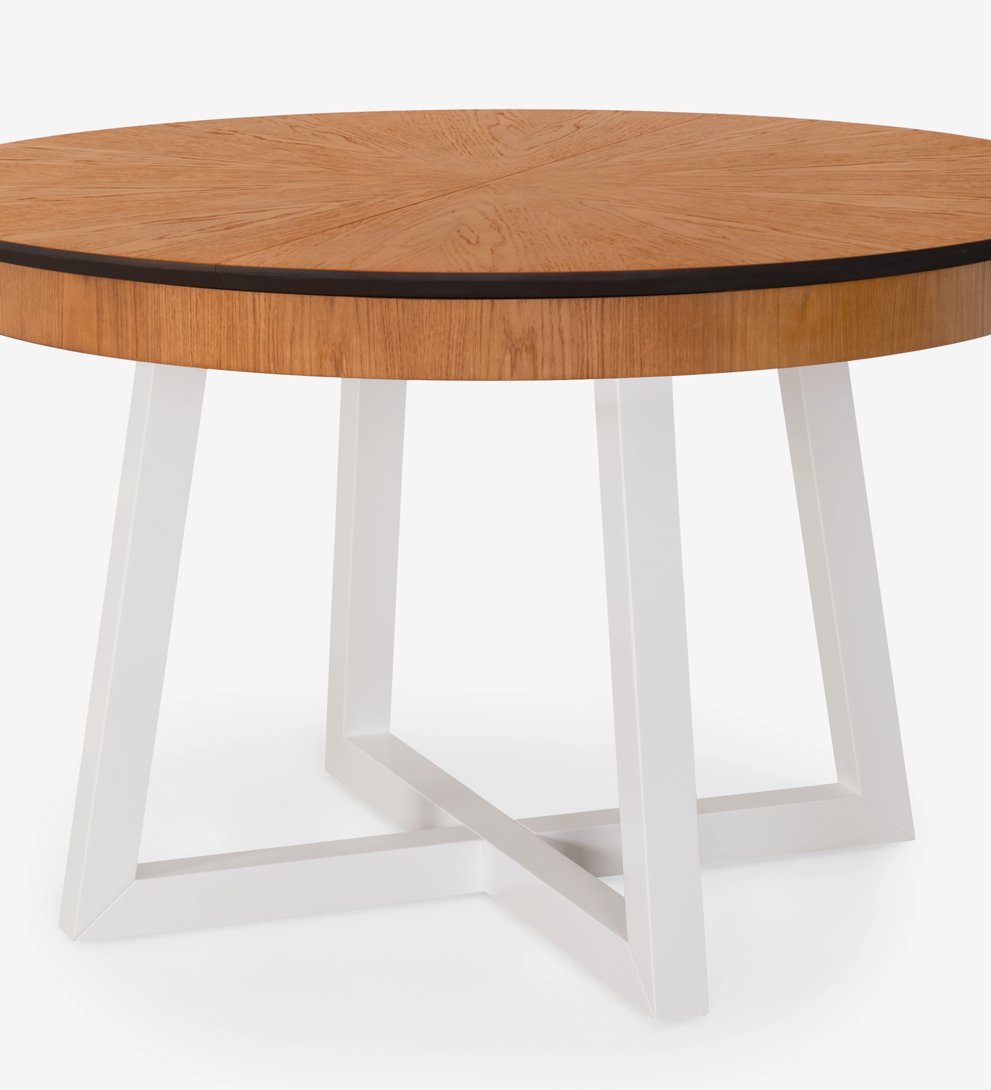Mesa de comedor redonda extensible con tablero de roble miel y patas lacadas en perla.