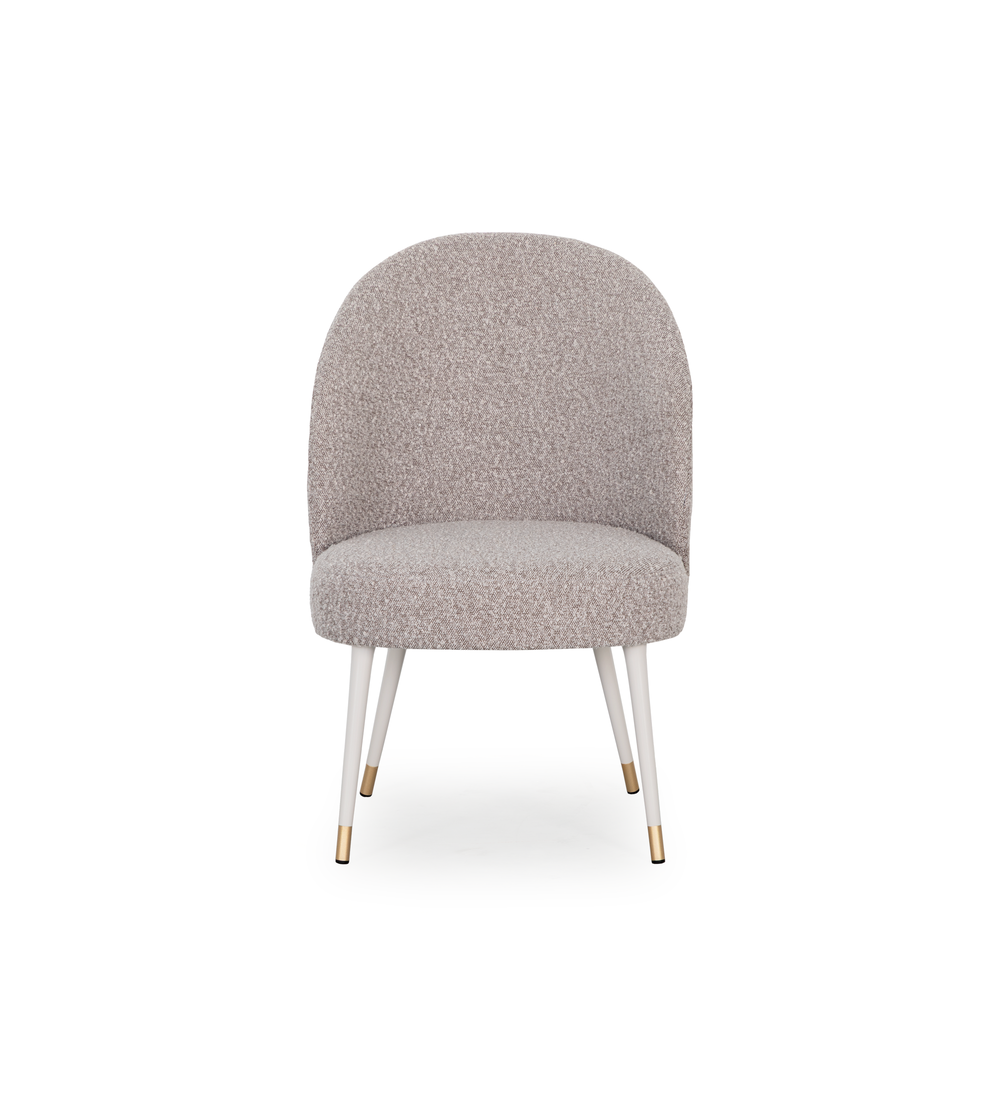 Sillón Geneve tapizado en tela toffee, pies lacados perla y detalle dorado.