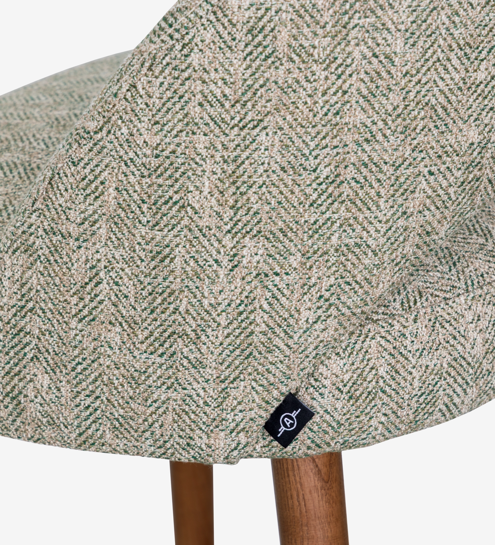 Stool upholstered in green fabric, with walnut-colored wood leg.