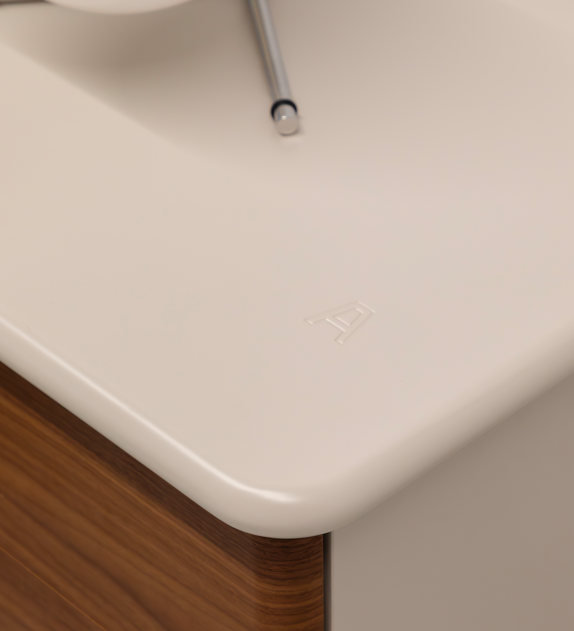 Bedside table with 2 drawers in natural walnut, pearl structure, and integrated wireless phone charger in the top.