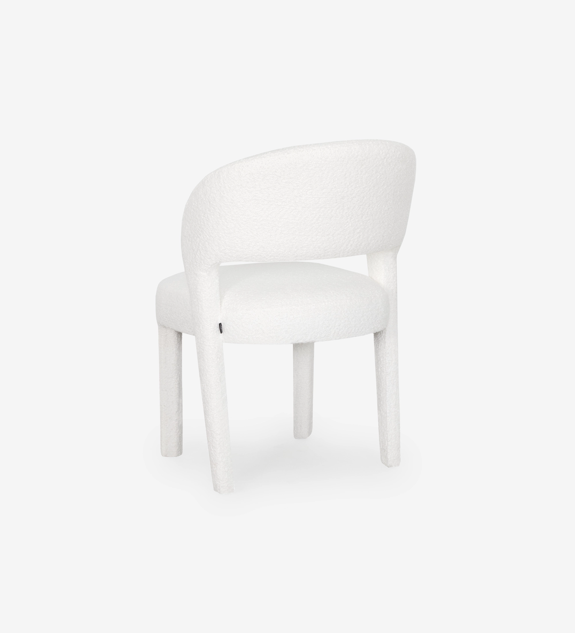 Chair upholstered in white fabric.