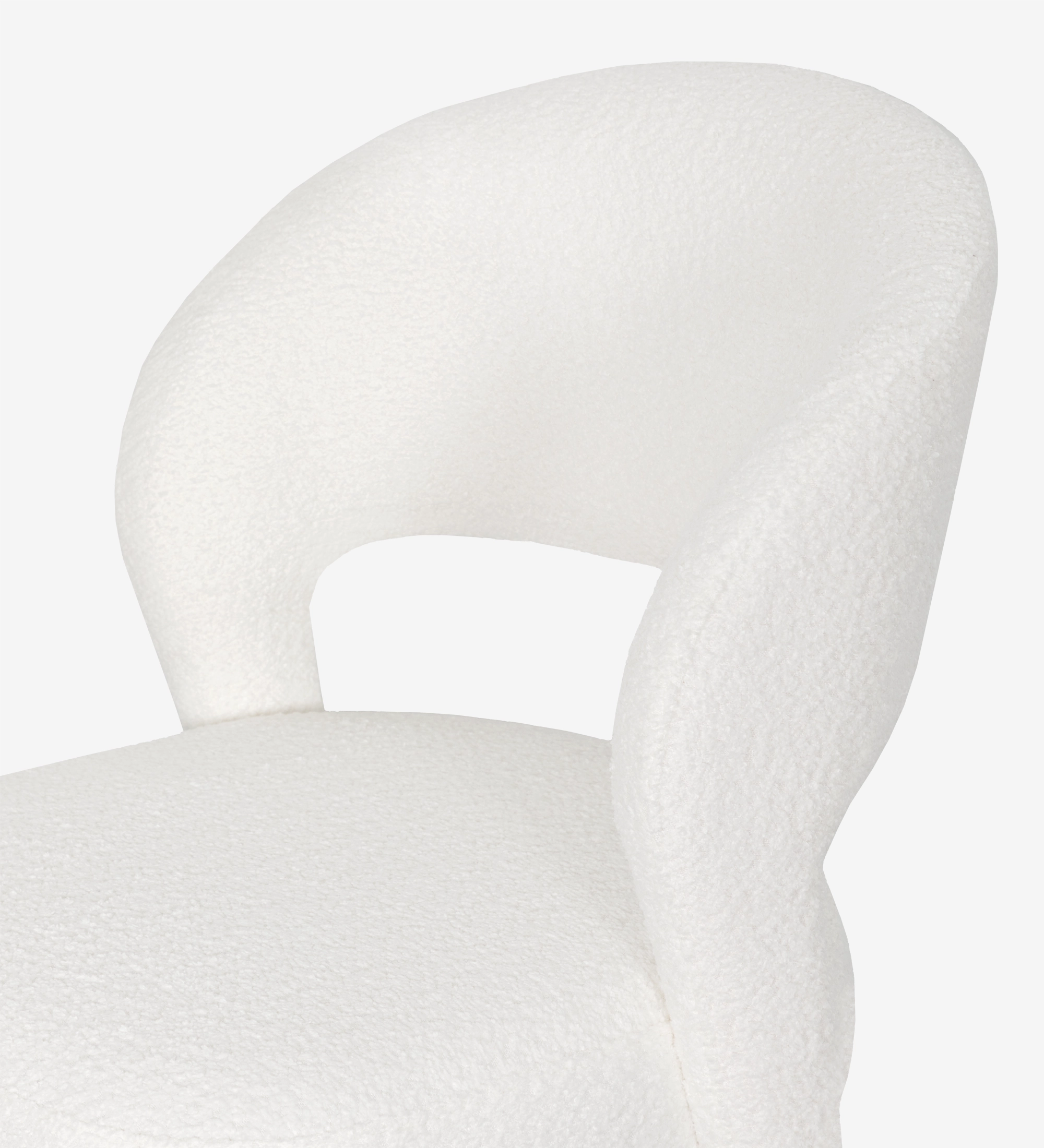 Chair upholstered in white fabric.
