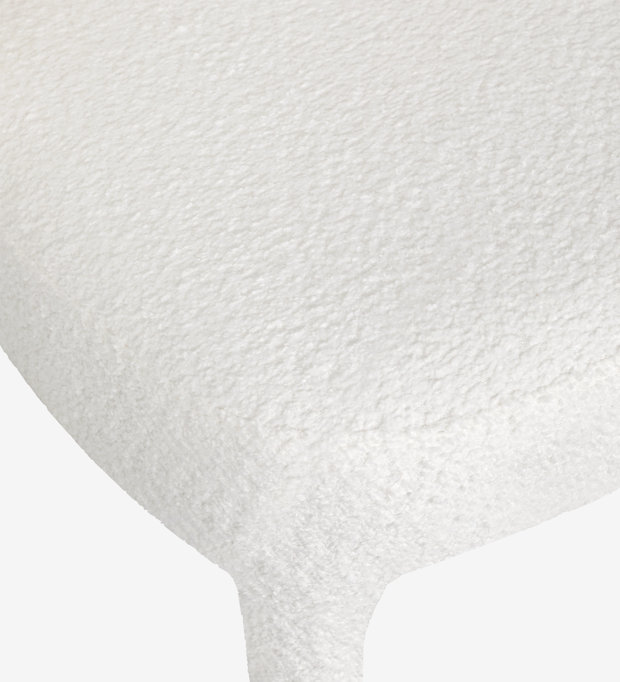 Chair upholstered in white fabric.