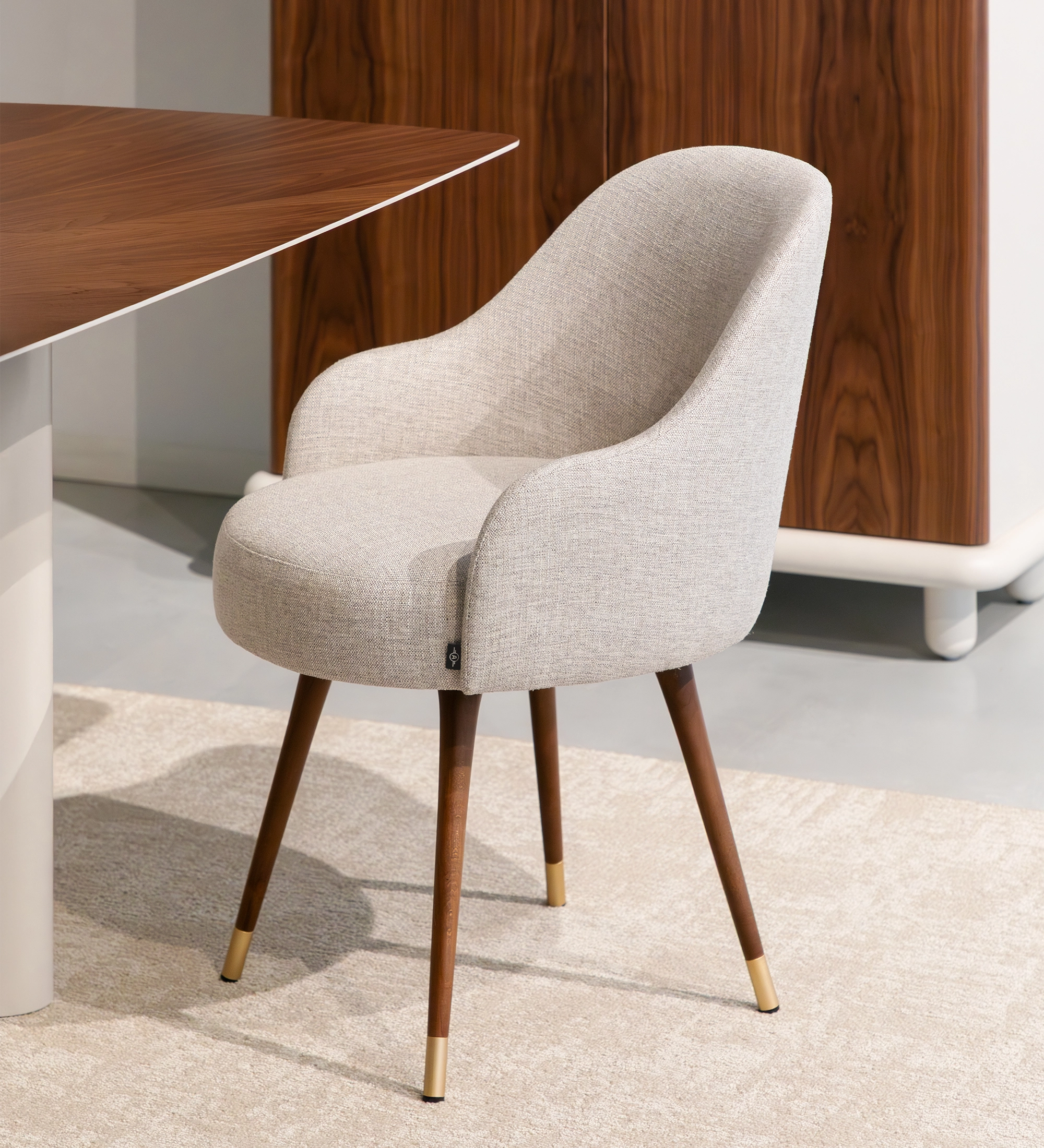 Geneve Chair light gray upholstered curved seat with walnut legs and brass tips