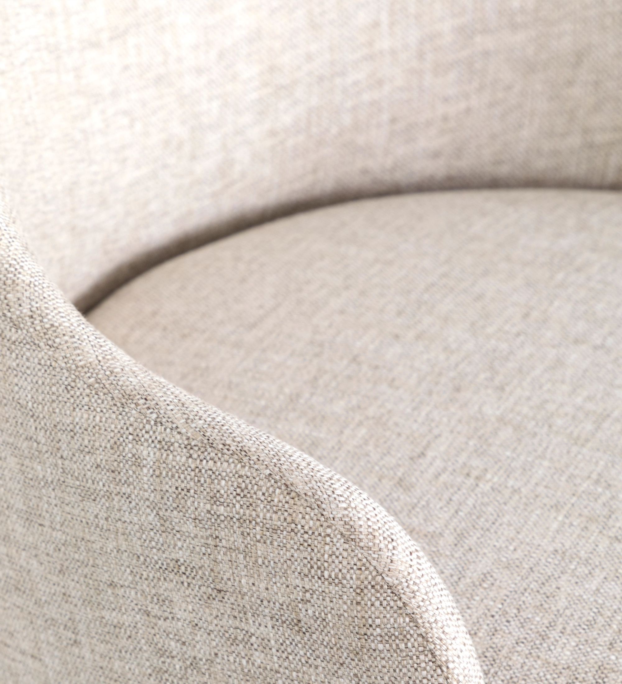 Geneve Chair beige textured upholstery with curved back and rounded seat