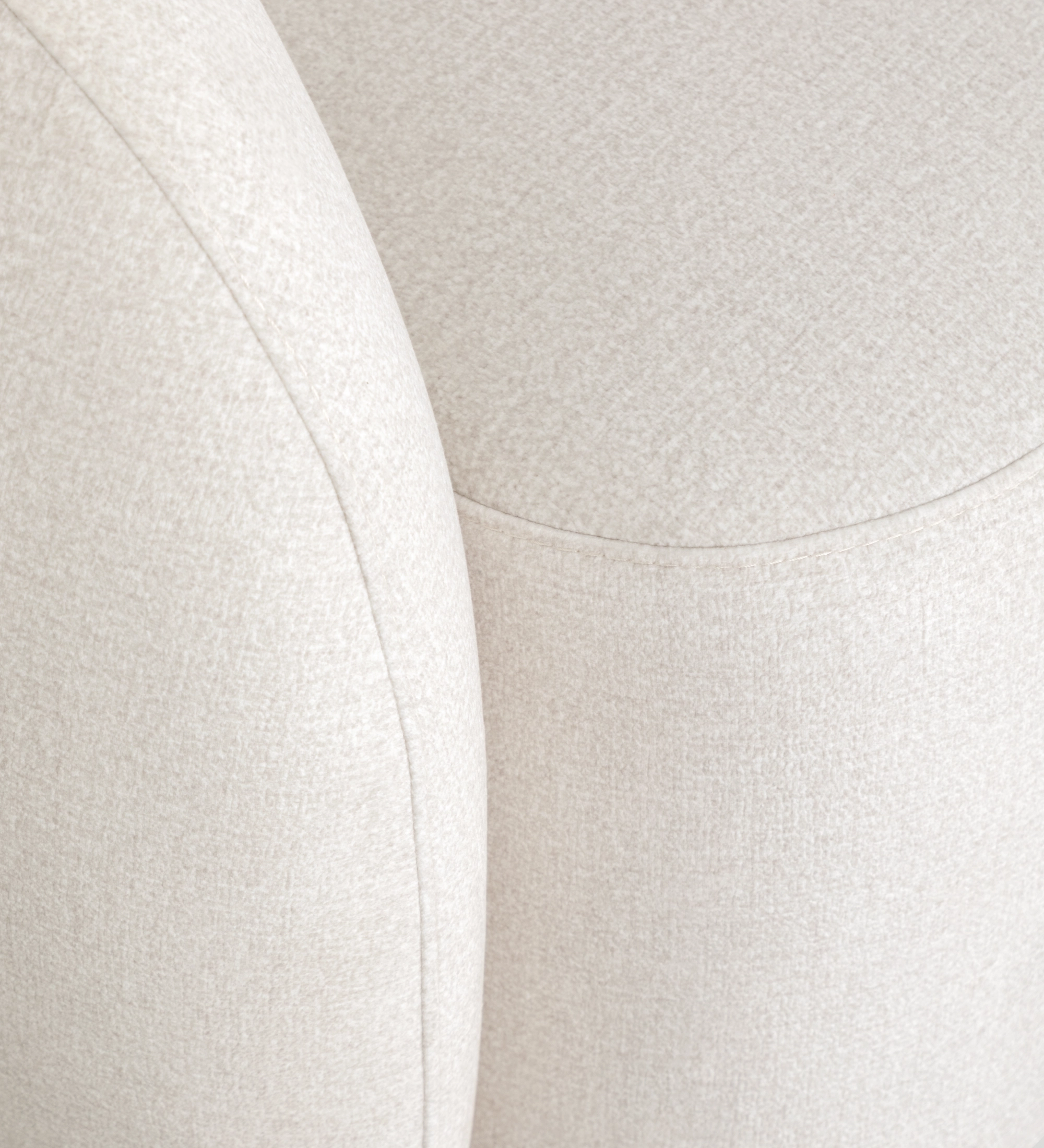 Armchair with a fully upholstered pearl-fabric finish and a swivel base.