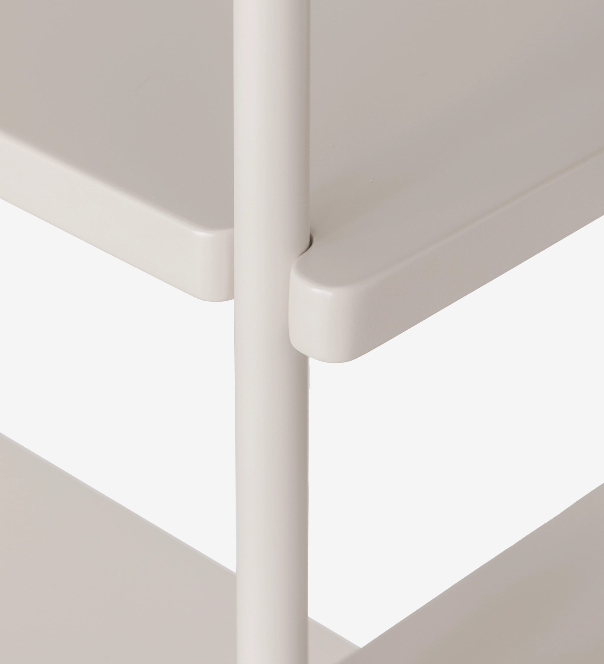 Cream rounded shelf corner with vertical cylindrical support on Bookcase Paris