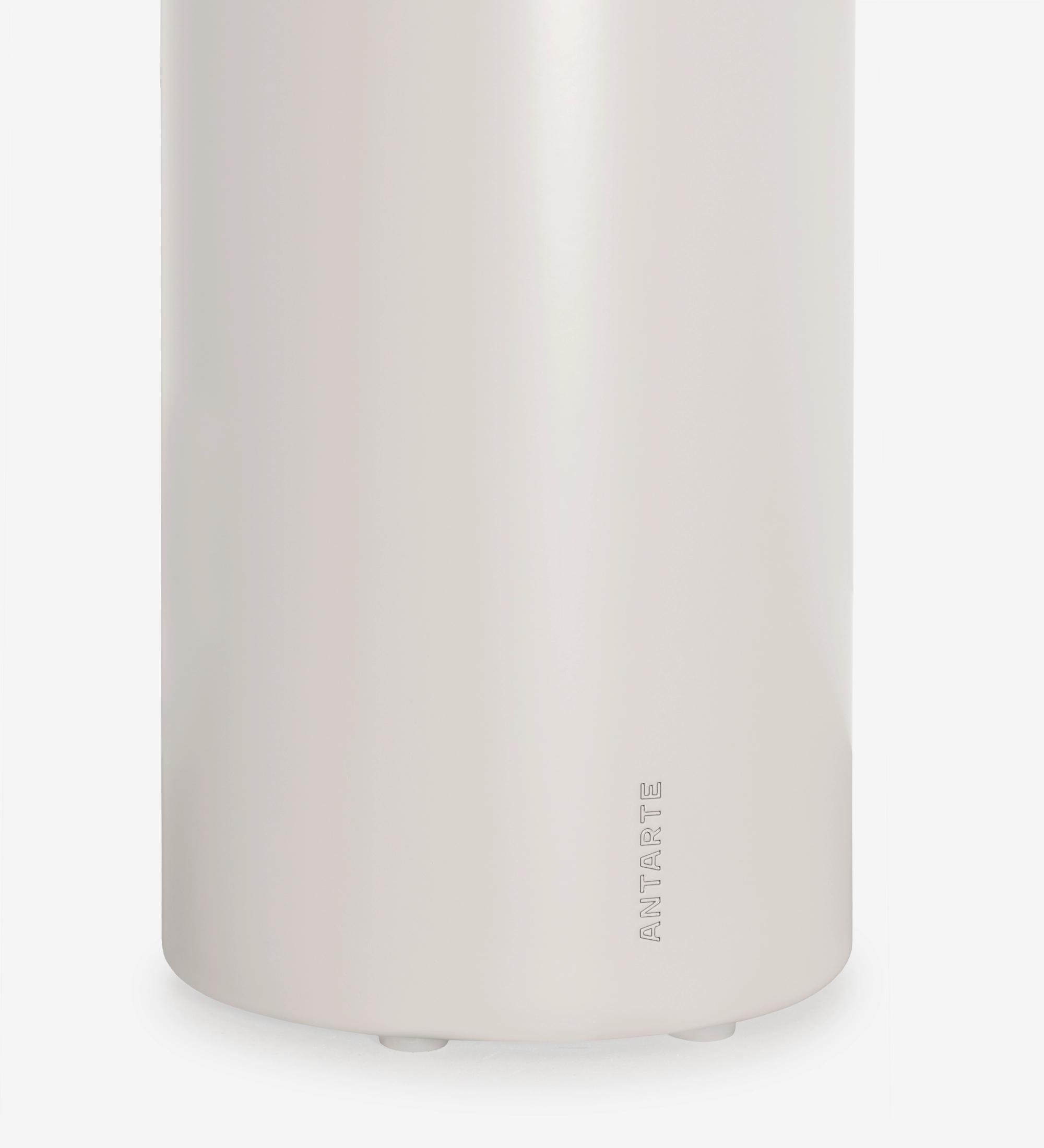 Paris Side Table close-up of cylindrical beige base with Antarte embossing